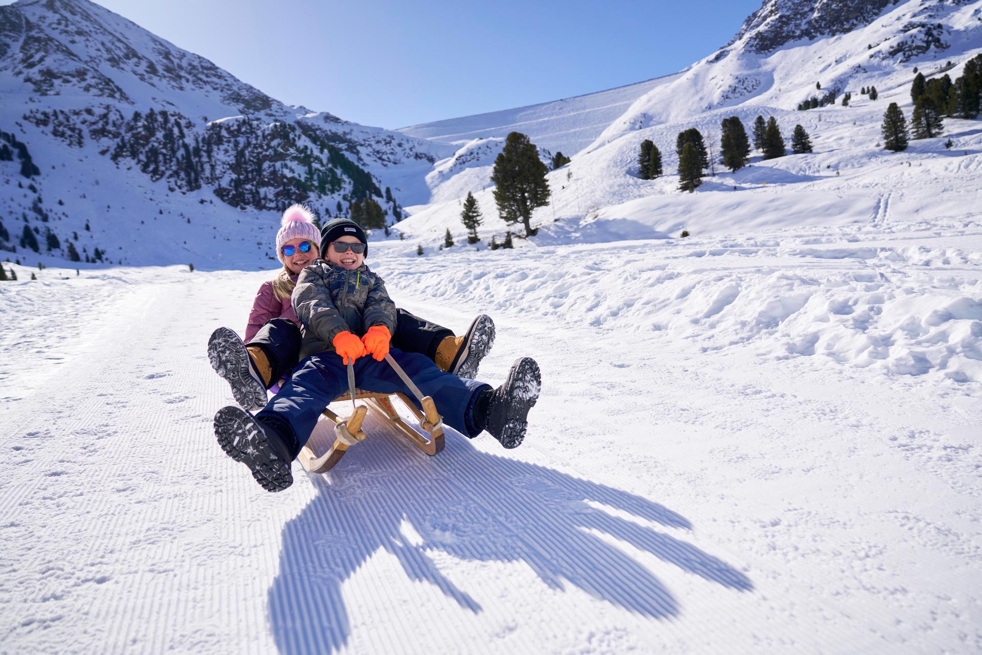 Mountain-Warehouse-Kids-Sledding
